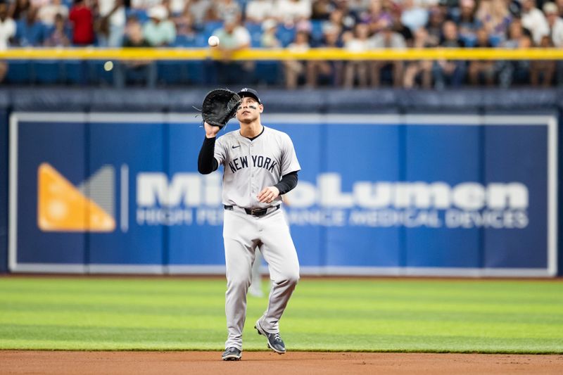 May 11, 2024; St. Petersburg, Florida, USA; New York Yankees first base Anthony Rizzo (48) makes a catch for an out against the Tampa Bay Rays during the third inning at Tropicana Field. Mandatory Credit: Matt Pendleton-USA TODAY Sports