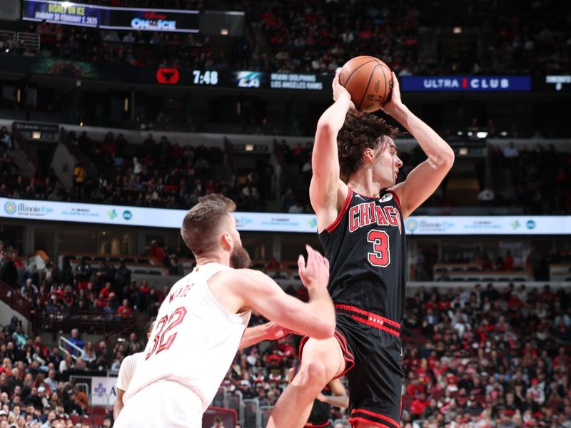 CHICAGO, IL - NOVEMBER 11: Josh Giddey #3 of the Chicago Bulls passes the ball during the game against the Cleveland Cavaliers on November 11, 2024 at United Center in Chicago, Illinois. NOTE TO USER: User expressly acknowledges and agrees that, by downloading and or using this photograph, User is consenting to the terms and conditions of the Getty Images License Agreement. Mandatory Copyright Notice: Copyright 2024 NBAE (Photo by Jeff Haynes/NBAE via Getty Images)