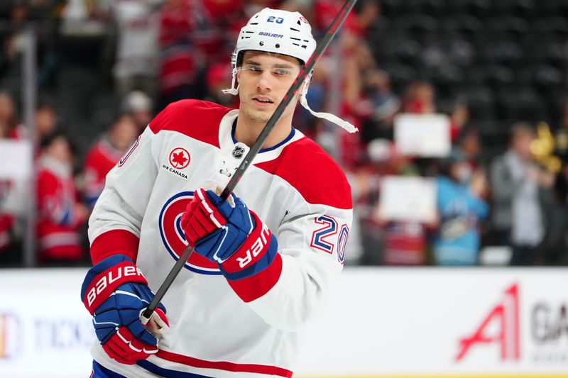 Nov 26, 2025; Las Vegas, Nevada, USA; MontrÈal Canadiens left wing Juraj Slafkovsk˝ (20) warms up before a game against the Vegas Golden Knights at T-Mobile Arena. Mandatory Credit: Stephen R. Sylvanie-Imagn Images