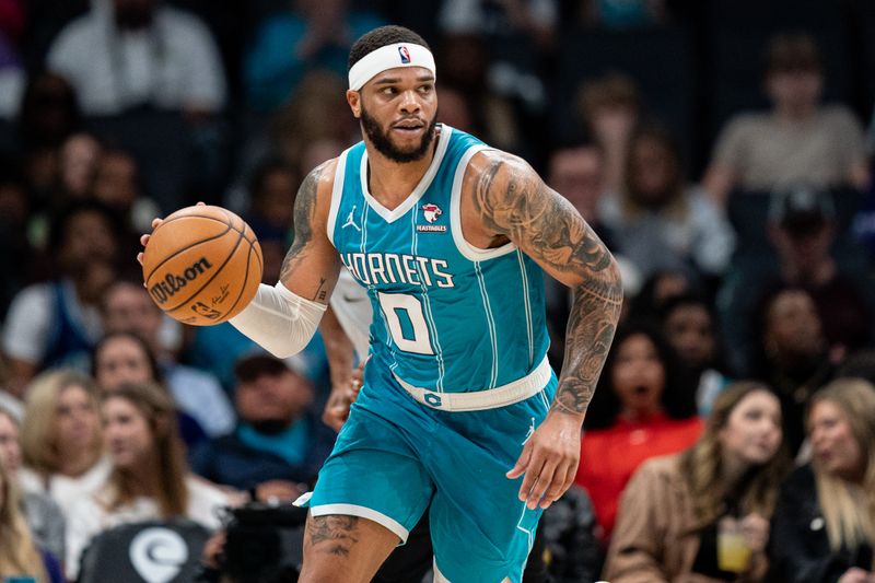 CHARLOTTE, NORTH CAROLINA - JANUARY 27: Miles Bridges #0 of the Charlotte Hornets brings the ball up court against the Utah Jazz during their game at Spectrum Center on January 27, 2024 in Charlotte, North Carolina. NOTE TO USER: User expressly acknowledges and agrees that, by downloading and or using this photograph, User is consenting to the terms and conditions of the Getty Images License Agreement. (Photo by Jacob Kupferman/Getty Images)