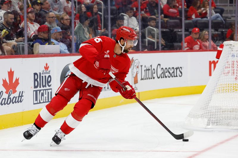 Oct 4, 2024; Detroit, Michigan, USA;  Detroit Red Wings defenseman Erik Gustafsson (56) skates with the puck in the third period against the Ottawa Senators at Little Caesars Arena. Mandatory Credit: Rick Osentoski-Imagn Images