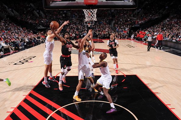 PORTLAND, OR - DECEMBER 14:  Scoot Henderson #00 of the Portland Trail Blazers goes to the basket during the game on December 14, 2023 at the Moda Center Arena in Portland, Oregon. NOTE TO USER: User expressly acknowledges and agrees that, by downloading and or using this photograph, user is consenting to the terms and conditions of the Getty Images License Agreement. Mandatory Copyright Notice: Copyright 2023 NBAE (Photo by Cameron Browne/NBAE via Getty Images)