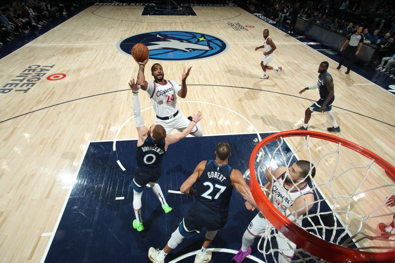 MINNEAPOLIS, MN -  JANUARY 6:  Norman Powell #24 of the LA Clippers shoots the ball during the game against the Minnesota Timberwolves on January 6, 2025 at Target Center in Minneapolis, Minnesota. NOTE TO USER: User expressly acknowledges and agrees that, by downloading and or using this Photograph, user is consenting to the terms and conditions of the Getty Images License Agreement. Mandatory Copyright Notice: Copyright 2025 NBAE (Photo by Jordan Johnson/NBAE via Getty Images)