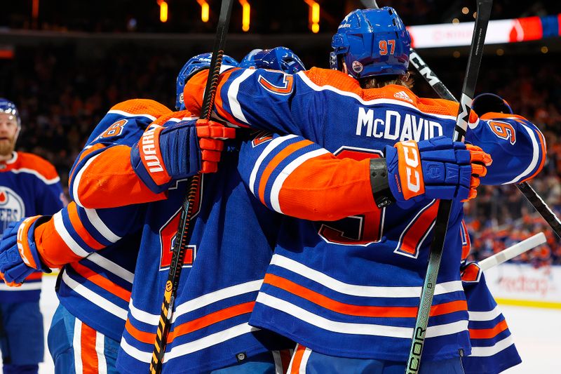 Dec 8, 2023; Edmonton, Alberta, CAN; The Edmonton Oilers celebrate a goal scored by defensemen Evan Bouchard (2) during the first period against the Minnesota Wild at Rogers Place. Mandatory Credit: Perry Nelson-USA TODAY Sports