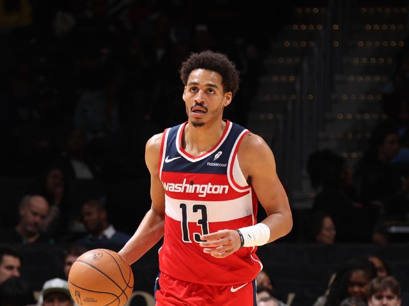 WASHINGTON, DC -? MARCH 8:  Jordan Poole #13 of the Washington Wizards handles the ball during the game  on March 8, 2024 at Capital One Arena in Washington, DC. NOTE TO USER: User expressly acknowledges and agrees that, by downloading and or using this Photograph, user is consenting to the terms and conditions of the Getty Images License Agreement. Mandatory Copyright Notice: Copyright 2024 NBAE (Photo by Stephen Gosling/NBAE via Getty Images)