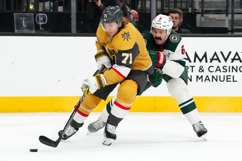 Feb 12, 2024; Las Vegas, Nevada, USA; Vegas Golden Knights center William Karlsson (71) skates ahead of Minnesota Wild defenseman Jake Middleton (5) during the third period at T-Mobile Arena. Mandatory Credit: Stephen R. Sylvanie-USA TODAY Sports