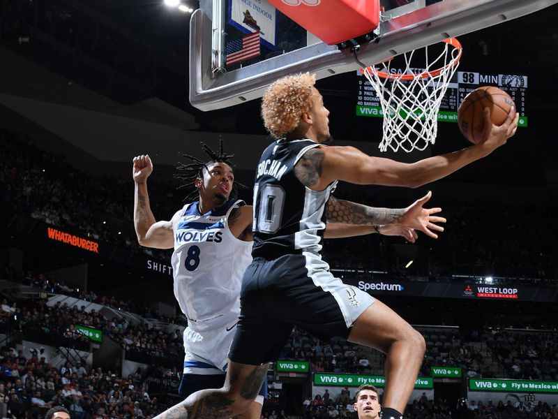 SAN ANTONIO, TX - NOVEMBER 2: Jeremy Sochan #10 of the San Antonio Spurs drives to the basket during the game against the Minnesota Timberwolves on November 2, 2024 at the Frost Bank Center in San Antonio, Texas. NOTE TO USER: User expressly acknowledges and agrees that, by downloading and or using this photograph, user is consenting to the terms and conditions of the Getty Images License Agreement. Mandatory Copyright Notice: Copyright 2024 NBAE (Photos by Michael Gonzales/NBAE via Getty Images)