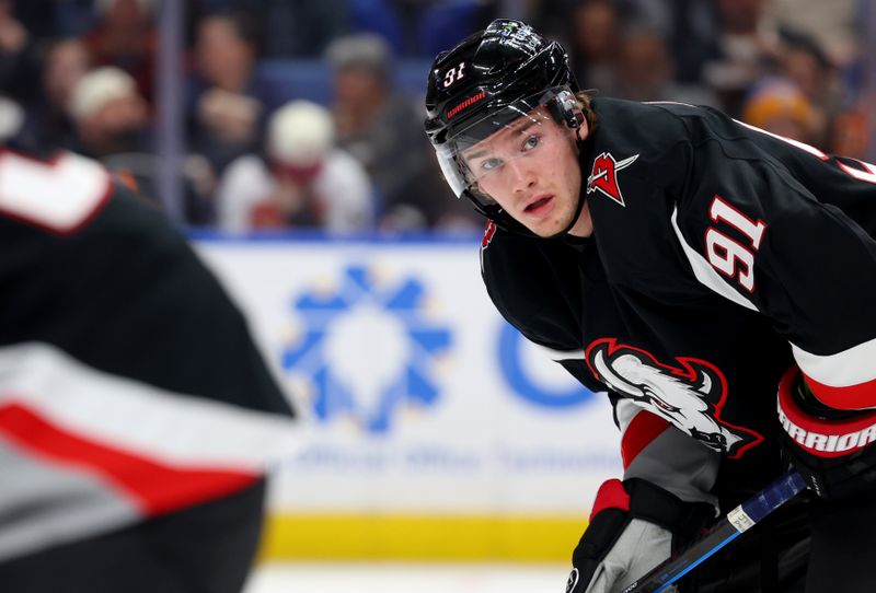 Dec 18, 2025; Buffalo, New York, USA;  Buffalo Sabres right wing Josh Doan (91) waits for the face-off during the second period against the Philadelphia Flyers at KeyBank Center. Mandatory Credit: Timothy T. Ludwig-Imagn Images