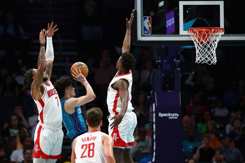 CHARLOTTE, NORTH CAROLINA - JANUARY 26: LaMelo Ball #1 of the Charlotte Hornets attempts a jump shot during the first quarter of the game against the Houston Rockets at Spectrum Center on January 26, 2024 in Charlotte, North Carolina. NOTE TO USER: User expressly acknowledges and agrees that, by downloading and or using this photograph, User is consenting to the terms and conditions of the Getty Images License Agreement. (Photo by Jared C. Tilton/Getty Images)