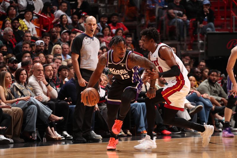 MIAMI, FL - JANUARY 31: Davion Mitchell #15 of the Sacramento Kings handles the ball during the game  against the Miami Heat on January 31, 2024 at Kaseya Center in Miami, Florida. NOTE TO USER: User expressly acknowledges and agrees that, by downloading and or using this Photograph, user is consenting to the terms and conditions of the Getty Images License Agreement. Mandatory Copyright Notice: Copyright 2024 NBAE (Photo by Issac Baldizon/NBAE via Getty Images)