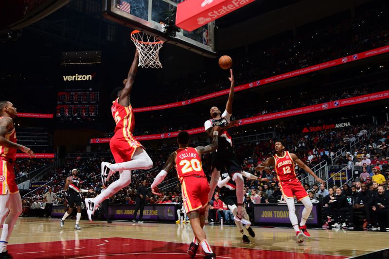 ATLANTA, GA - MARCH 3: Cam Reddish #5 of the Portland Trail Blazers drives to the basket during the game against the Atlanta Hawks on March 3, 2023 at State Farm Arena in Atlanta, Georgia.  NOTE TO USER: User expressly acknowledges and agrees that, by downloading and/or using this Photograph, user is consenting to the terms and conditions of the Getty Images License Agreement. Mandatory Copyright Notice: Copyright 2023 NBAE (Photo by Scott Cunningham/NBAE via Getty Images)