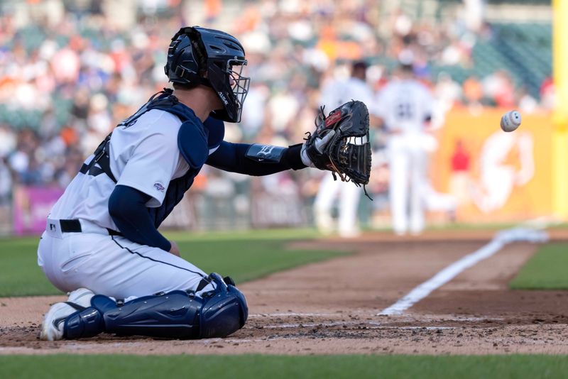 Jul 29, 2024; Detroit, Michigan, USA; Detroit Tigers catcher Dillion Dingler (38) warms up to start the second inning against the Cleveland Guardians at Comerica Park. Mandatory Credit: David Reginek-USA TODAY Sports