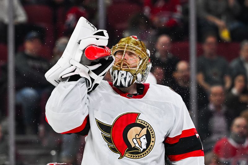 Jan 23, 2024; Montreal, Quebec, CAN; Ottawa Senators goalie Joonas Korpisalo (70) sprays water on his face during a break against the Montreal Canadiens during the second period at Bell Centre. Mandatory Credit: David Kirouac-USA TODAY Sports