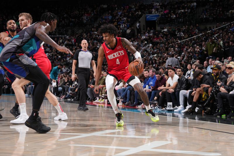 BROOKLYN, NY - JANUARY 27: Jalen Green #4 of the Houston Rockets dribbles the ball during the game against the Brooklyn Nets on January 27, 2024 at Barclays Center in Brooklyn, New York. NOTE TO USER: User expressly acknowledges and agrees that, by downloading and or using this Photograph, user is consenting to the terms and conditions of the Getty Images License Agreement. Mandatory Copyright Notice: Copyright 2024 NBAE (Photo by Jesse D. Garrabrant/NBAE via Getty Images)