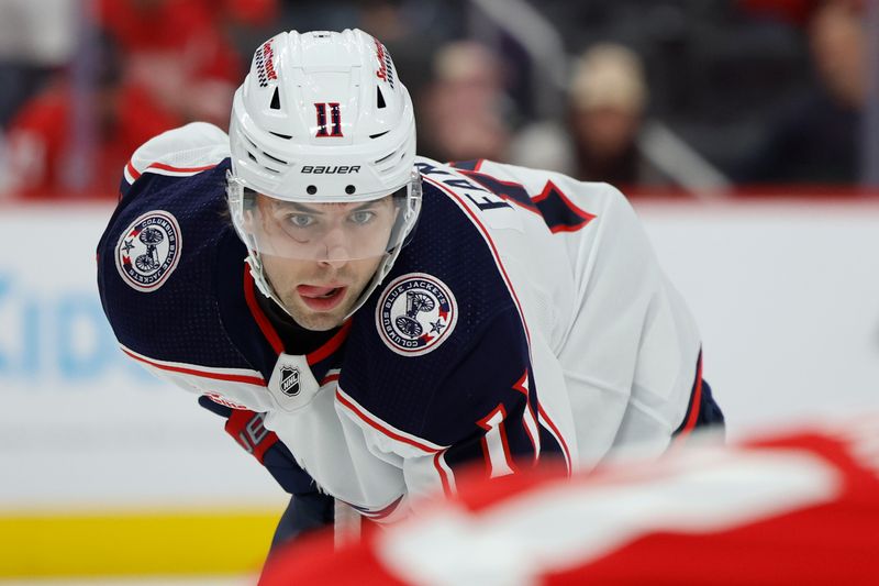 Nov 11, 2023; Detroit, Michigan, USA;  Columbus Blue Jackets center Adam Fantilli (11) prepares for a face off against the Detroit Red Wings in the first period at Little Caesars Arena. Mandatory Credit: Rick Osentoski-USA TODAY Sports