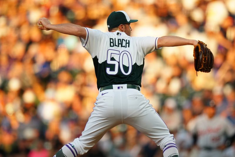 Jul 1, 2023; Denver, Colorado, USA; Colorado Rockies relief pitcher Ty Blach (50) pitches in the fourth inning against the Detroit Tigers at Coors Field. Mandatory Credit: Ron Chenoy-USA TODAY Sports