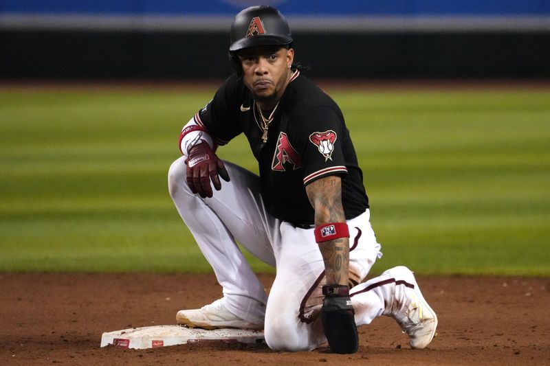 Aug 8, 2023; Phoenix, Arizona, USA; Arizona Diamondbacks second baseman Ketel Marte (4) reacts after being defeated by the Los Angeles Dodgers at Chase Field. Mandatory Credit: Joe Camporeale-USA TODAY Sports