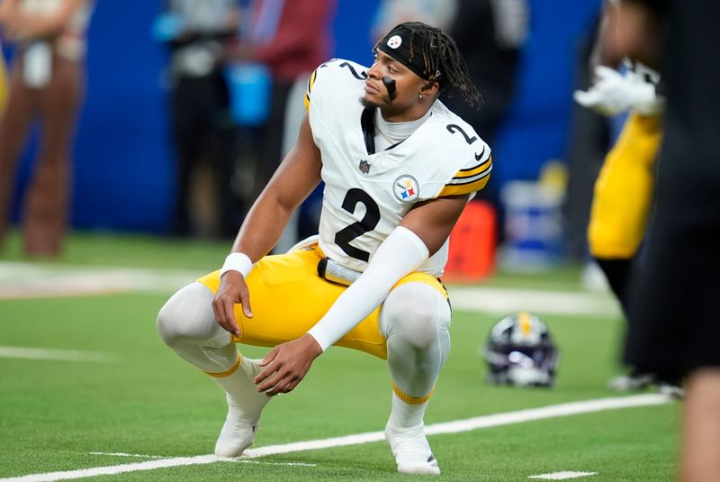 Pittsburgh Steelers quarterback Justin Fields (2) warms up before an NFL football game against the Indianapolis Colts Sunday, Sept. 29, 2024, in Indianapolis. (AP Photo/Michael Conroy)