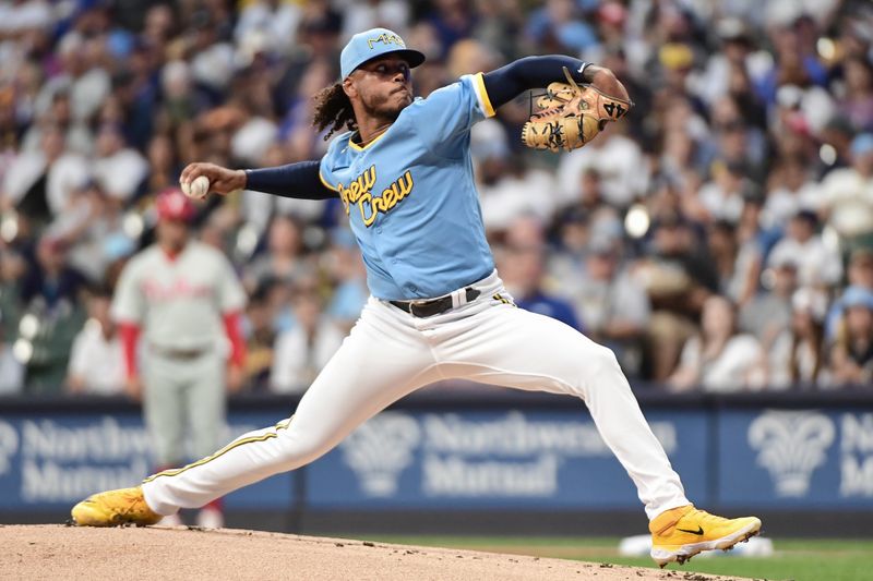 Sep 1, 2023; Milwaukee, Wisconsin, USA; Milwaukee Brewers pitcher Freddy Peralta (51) pitches against the Philadelphia Phillies in the first inning at American Family Field. Mandatory Credit: Benny Sieu-USA TODAY Sports