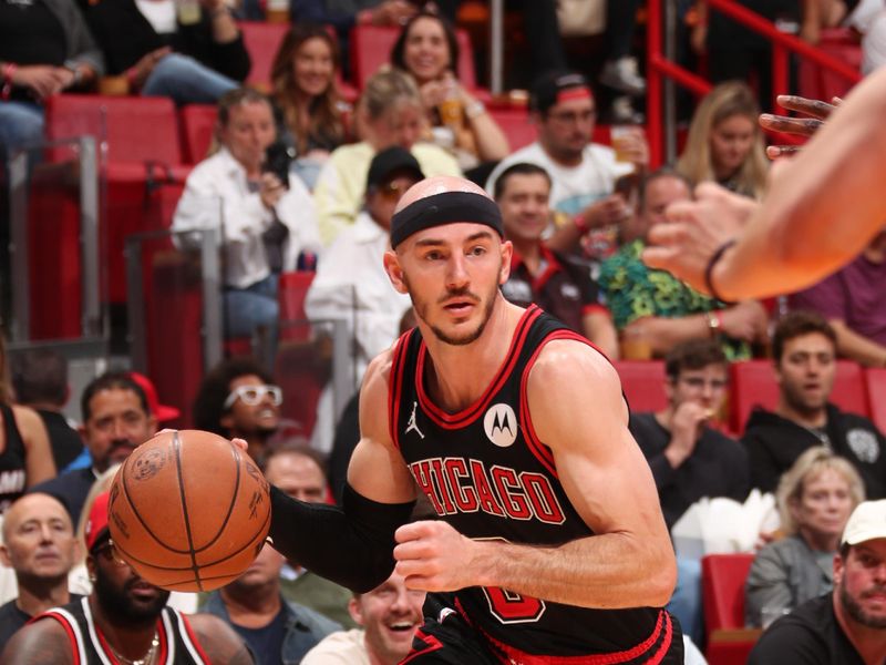 MIAMI, FL - APRIL 19: Alex Caruso #6 of the Chicago Bulls dribbles the ball during the game against the Miami Heat during the 2024 Play-In Tournament on April 19, 2024 at Kaseya Center in Miami, Florida. NOTE TO USER: User expressly acknowledges and agrees that, by downloading and or using this Photograph, user is consenting to the terms and conditions of the Getty Images License Agreement. Mandatory Copyright Notice: Copyright 2024 NBAE (Photo by Issac Baldizon/NBAE via Getty Images)