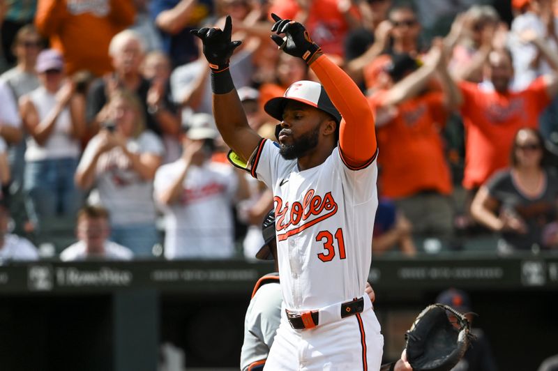 Sep 22, 2024; Baltimore, Maryland, USA; Baltimore Orioles outfielder Cedric Mullins (31) celebrates at home plate after hitting a 
fifth inning solo home run against the Detroit Tigers  at Oriole Park at Camden Yards. Mandatory Credit: Tommy Gilligan-Imagn Images