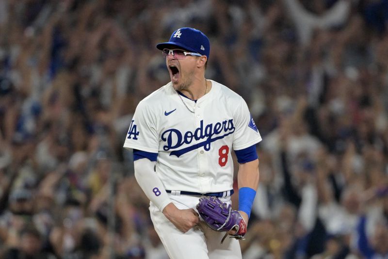 Oct 11, 2024; Los Angeles, California, USA; Los Angeles Dodgers third baseman Enrique Hernandez (8) celebrates after defeating the San Diego Padres during game five of the NLDS for the 2024 MLB Playoffs at Dodger Stadium. Mandatory Credit: Jayne Kamin-Oncea-Imagn Images