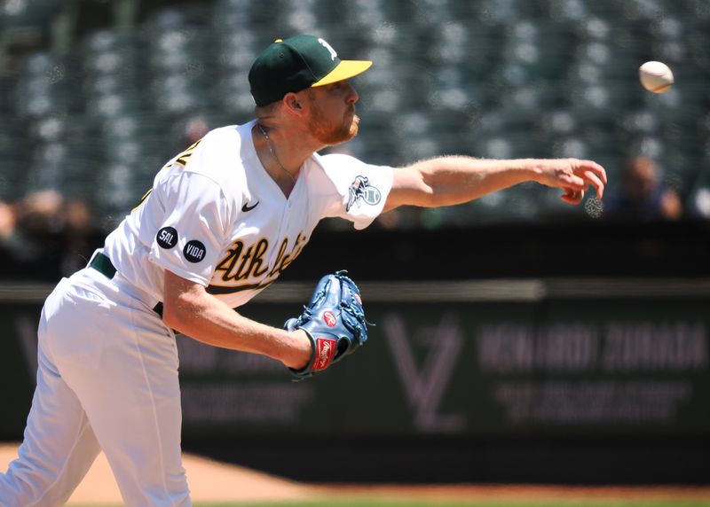 May 31, 2023; Oakland, California, USA; Oakland Athletics relief pitcher Richard Lovelady (45) pitches the ball against the Atlanta Braves during the sixth inning at Oakland-Alameda County Coliseum. Mandatory Credit: Kelley L Cox-USA TODAY Sports