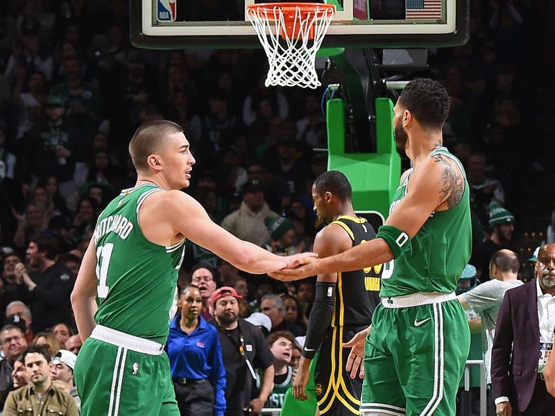 BOSTON, MA - MARCH 3: Payton Pritchard #11 of the Boston Celtics high fives Jayson Tatum #0 during the game against the Golden State Warriors on March 3, 2024 at the TD Garden in Boston, Massachusetts. NOTE TO USER: User expressly acknowledges and agrees that, by downloading and or using this photograph, User is consenting to the terms and conditions of the Getty Images License Agreement. Mandatory Copyright Notice: Copyright 2024 NBAE  (Photo by Brian Babineau/NBAE via Getty Images)