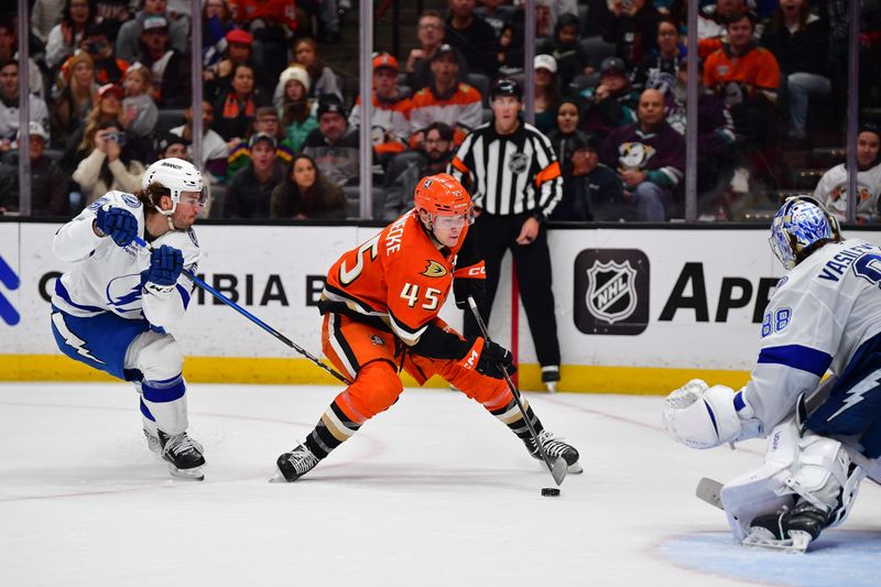 Dec 31, 2025; Anaheim, California, USA; Anaheim Ducks right wing Beckett Sennecke (45) moves in for a shot against Tampa Bay Lightning goaltender Andrei Vasilevskiy (88) during the overtime period at Honda Center. Mandatory Credit: Gary A. Vasquez-Imagn Images