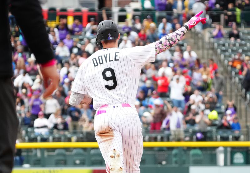 May 14, 2023; Denver, Colorado, USA; Colorado Rockies center fielder Brenton Doyle (9) runs off his solo home run in the fifth inning against the Philadelphia Phillies at Coors Field. Mandatory Credit: Ron Chenoy-USA TODAY Sports