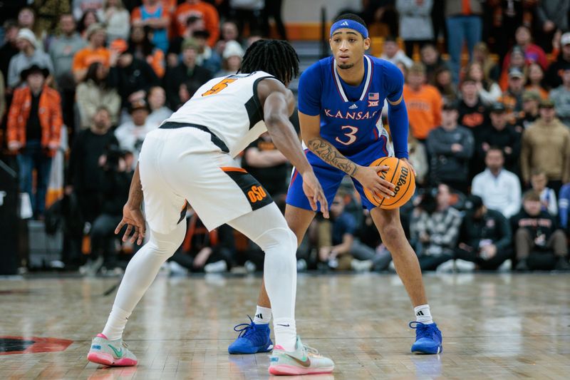 Jan 16, 2024; Stillwater, Oklahoma, USA; Kansas Jayhawks guard Dajuan Harris Jr. (3) looks to set the play around Oklahoma State Cowboys guard Quion Williams (5) during the second half at Gallagher-Iba Arena. Mandatory Credit: William Purnell-USA TODAY Sports