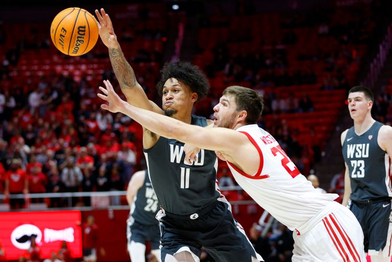 Jan 19, 2023; Salt Lake City, Utah, USA; Washington State Cougars forward DJ Rodman (11) and Utah Utes guard Rollie Worster (25) battle in the first half at Jon M. Huntsman Center. Mandatory Credit: Jeffrey Swinger-USA TODAY Sports