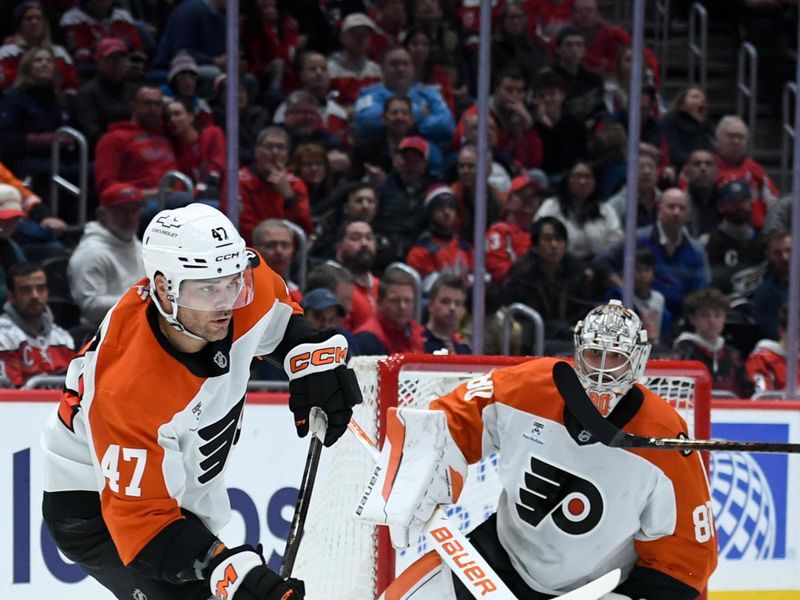 Feb 25, 2026; Washington, District of Columbia, USA; Philadelphia Flyers defenseman Noah Juulsen (47) passes the puck against the Washington Capitals during the third period at Capital One Arena. Mandatory Credit: Hannah Foslien-Imagn Images