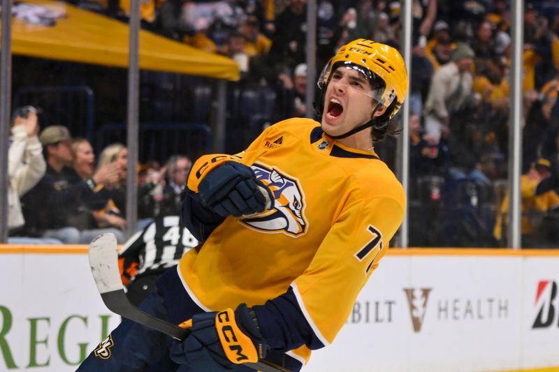 Oct 28, 2025; Nashville, Tennessee, USA;  Nashville Predators right wing Luke Evangelista (77) celebrates his goal against the Tampa Bay Lightning during the third period at Bridgestone Arena. Mandatory Credit: Steve Roberts-Imagn Images