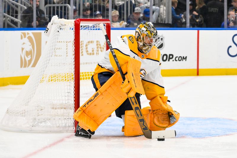 Dec 27, 2025; St. Louis, Missouri, USA; Nashville Predators goaltender Juuse Saros (74) defends the net against the St. Louis Blues during the second period at Enterprise Center. Mandatory Credit: Jeff Curry-Imagn Images