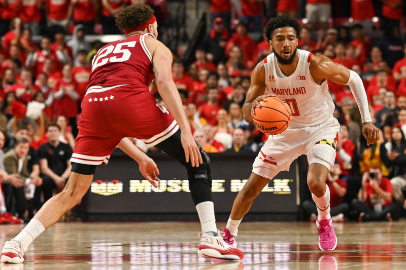 Jan 31, 2023; College Park, Maryland, USA;  Maryland Terrapins guard Don Carey (0) dribbles by Indiana Hoosiers forward Race Thompson (25) during the second half at Xfinity Center. Mandatory Credit: Tommy Gilligan-USA TODAY Sports