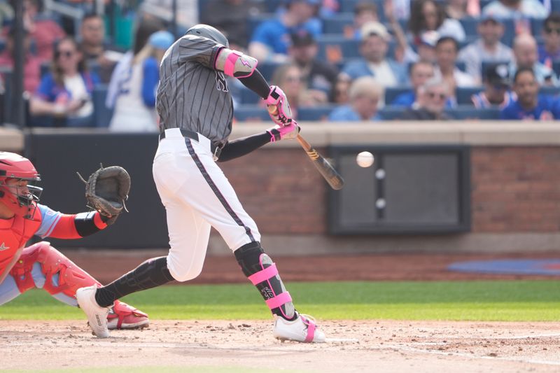 Apr 19, 2025; New York City, New York, USA; New York Mets left fielder Brandon Nimmo (9) hits a single against the St. Louis Cardinals during the second inning at Citi Field. Mandatory Credit: Gregory Fisher-Imagn Images
