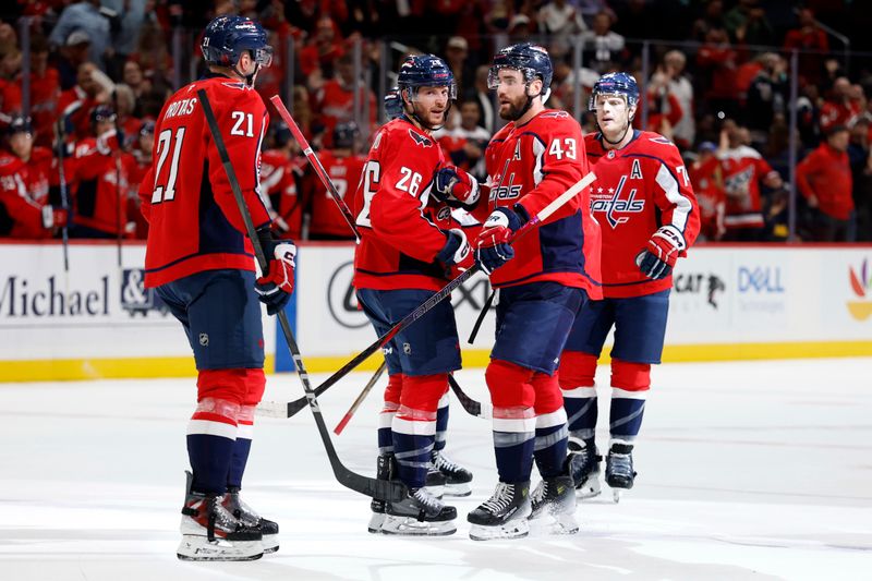 Oct 21, 2025; Washington, District of Columbia, USA; Washington Capitals right wing Tom Wilson (43) celebrates with teammates after scoring an empty net goal against the Seattle Kraken at Capital One Arena. Mandatory Credit: Geoff Burke-Imagn Images