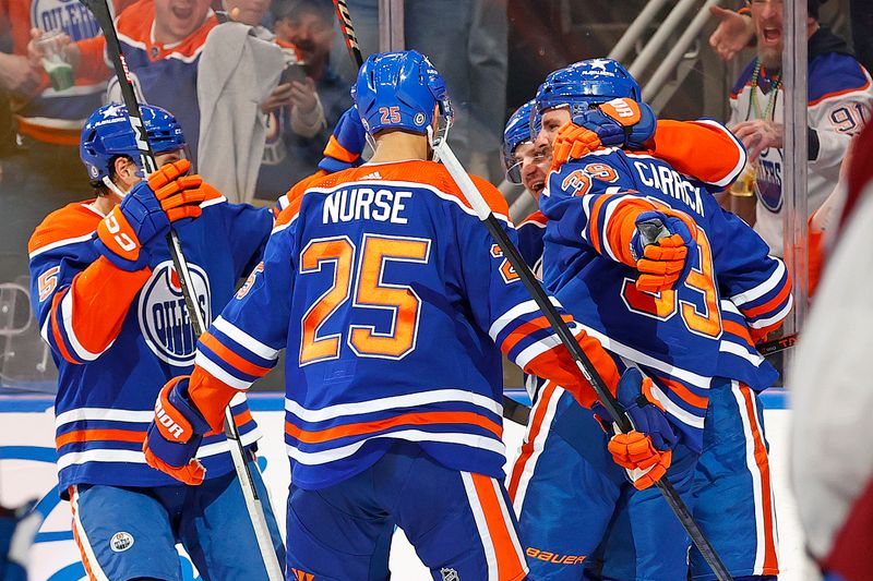 Mar 16, 2024; Edmonton, Alberta, CAN; The Edmonton Oilers celebrate a goal scored by forward Sam Carrick (39) during the third period against the Colorado Avalanche at Rogers Place. Mandatory Credit: Perry Nelson-USA TODAY Sports