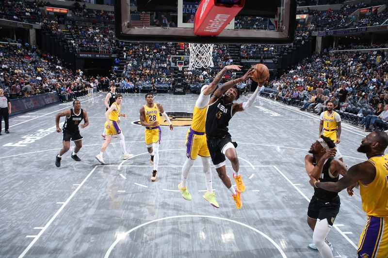 MEMPHIS, TN - APRIL 12: GG Jackson #45 of the Memphis Grizzlies drives to the basket during the game against the Los Angeles Lakers on April 12, 2024 at FedExForum in Memphis, Tennessee. NOTE TO USER: User expressly acknowledges and agrees that, by downloading and or using this photograph, User is consenting to the terms and conditions of the Getty Images License Agreement. Mandatory Copyright Notice: Copyright 2024 NBAE (Photo by Joe Murphy/NBAE via Getty Images)