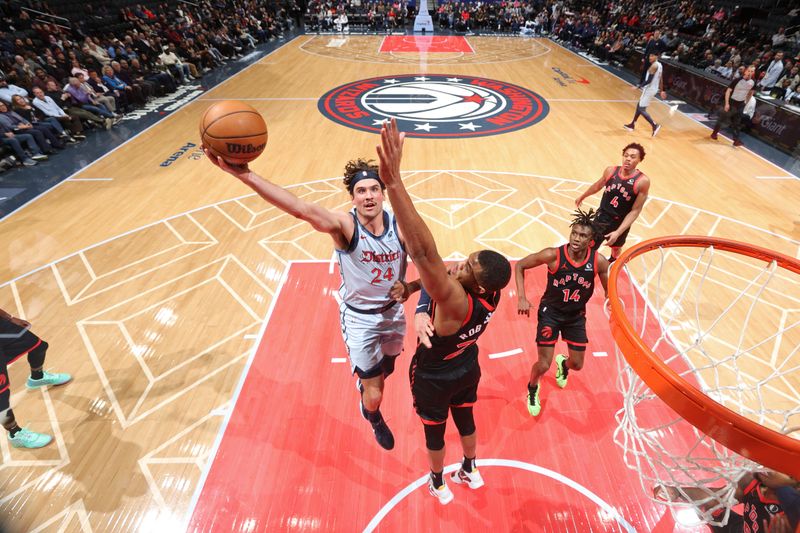 WASHINGTON, DC -?JANUARY 29: Corey Kispert #24 of the Washington Wizards drives to the basket during the game against the Toronto Raptors on January 29, 2025 at Capital One Arena in Washington, DC. NOTE TO USER: User expressly acknowledges and agrees that, by downloading and or using this Photograph, user is consenting to the terms and conditions of the Getty Images License Agreement. Mandatory Copyright Notice: Copyright 2025 NBAE (Photo by Stephen Gosling/NBAE via Getty Images)