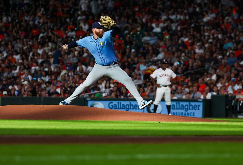 Aug 3, 2024; Houston, Texas, USA; Tampa Bay Rays starting pitcher Zack Littell (52) throws against the Houston Astros in the first inning at Minute Maid Park. Mandatory Credit: Thomas Shea-USA TODAY Sports