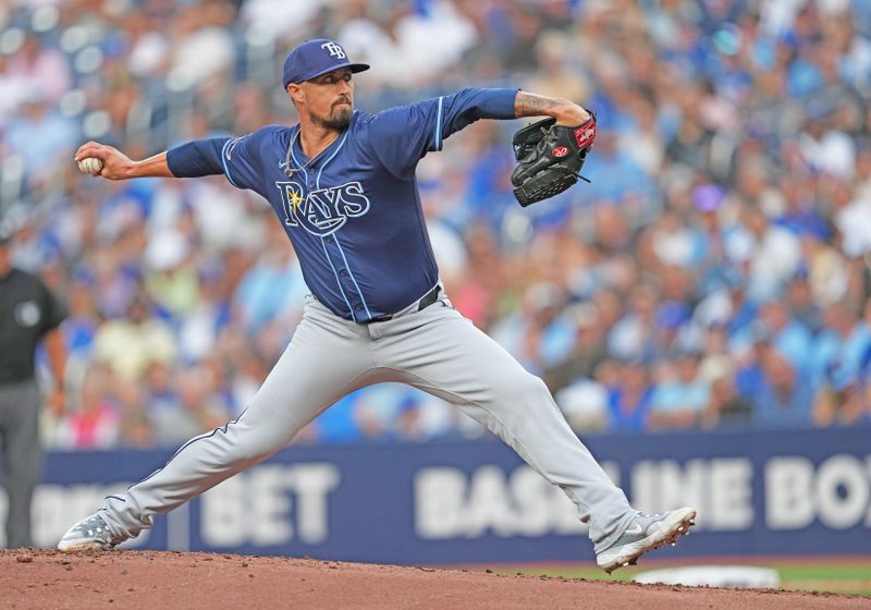 Jul 23, 2024; Toronto, Ontario, CAN; Tampa Bay Rays starting pitcher Shawn Armstrong (64) throws a pitch Toronto Blue Jays during the first inning at Rogers Centre. Mandatory Credit: Nick Turchiaro-USA TODAY Sports