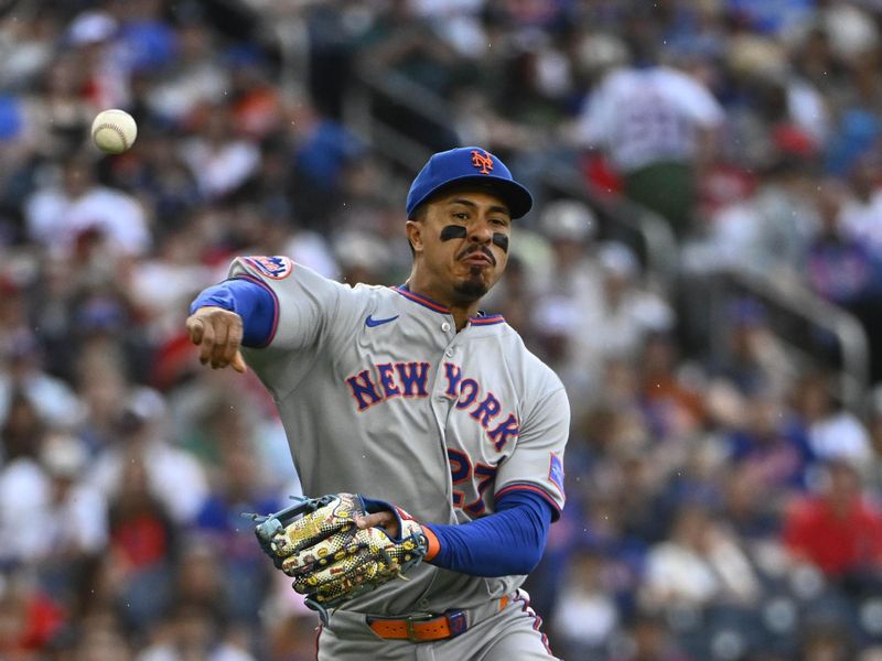 Apr 26, 2025; Washington, District of Columbia, USA; New York Mets third baseman Mark Vientos (27) attempts to throw out Washington Nationals outfielder James Wood (not shown) during the first inning at Nationals Park. Mandatory Credit: Brad Mills-Imagn Images