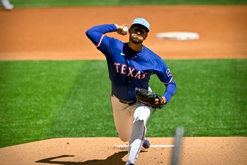 Mar 26, 2024; Arlington, Texas, USA; Texas Rangers starting pitcher Dane Dunning (33) pitches against the Boston Red Sox during the first inning at Globe Life Field. Mandatory Credit: Jerome Miron-USA TODAY Sports