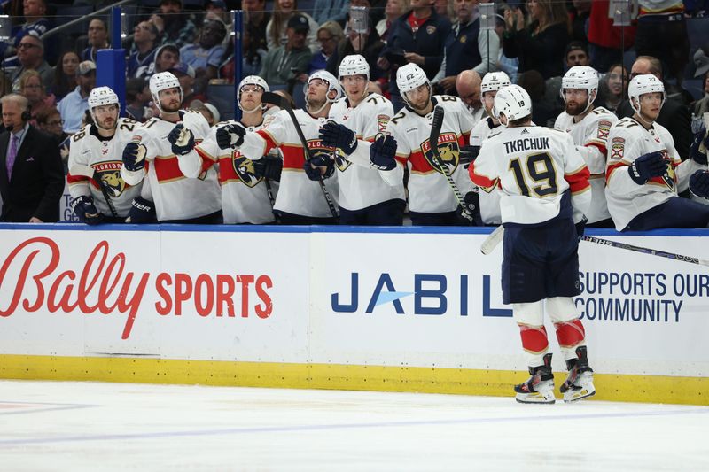 Feb 17, 2024; Tampa, Florida, USA;  Florida Panthers left wing Matthew Tkachuk (19) celebrates after scoring a goal against the Tampa Bay Lightning in the second period at Amalie Arena. Mandatory Credit: Nathan Ray Seebeck-USA TODAY Sports