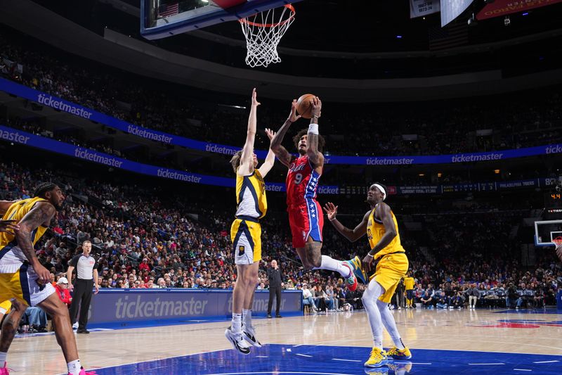 PHILADELPHIA, PA - DECEMBER 13: Kelly Oubre Jr. #9 of the Philadelphia 76ers drives to the basket during the game against the Indiana Pacers on December 13, 2024 at the Wells Fargo Center in Philadelphia, Pennsylvania NOTE TO USER: User expressly acknowledges and agrees that, by downloading and/or using this Photograph, user is consenting to the terms and conditions of the Getty Images License Agreement. Mandatory Copyright Notice: Copyright 2024 NBAE (Photo by Jesse D. Garrabrant/NBAE via Getty Images)