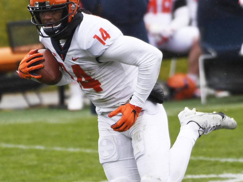 Dec 12, 2020; Evanston, Illinois, USA; Illinois Fighting Illini wide receiver Brian Hightower(14) catches a touchdown pass during the second half at Ryan Field. Mandatory Credit: David Banks-USA TODAY Sports