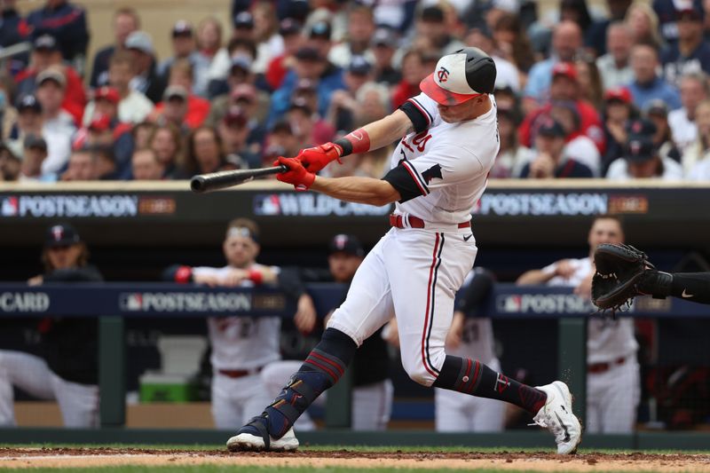 Oct 4, 2023; Minneapolis, Minnesota, USA; Minnesota Twins right fielder Max Kepler (26) hits a single in the fourth inning against the Toronto Blue Jays during game two of the Wildcard series for the 2023 MLB playoffs at Target Field. Mandatory Credit: Jesse Johnson-USA TODAY Sports