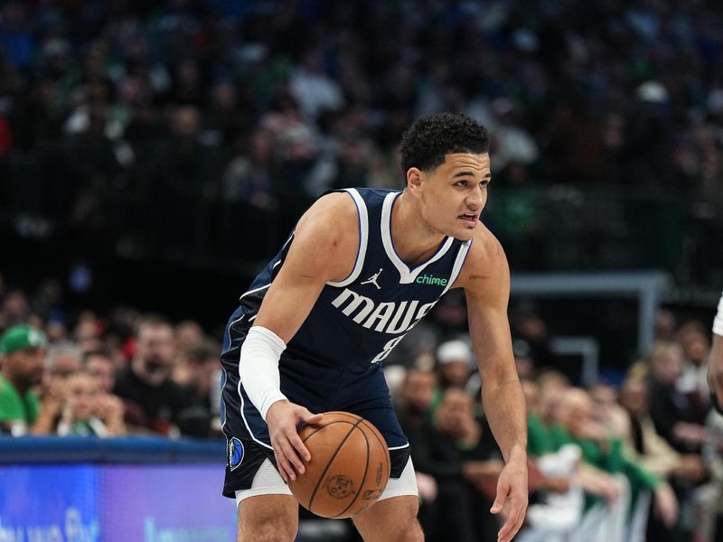 DALLAS, TX - JANUARY 22: Josh Green #8 of the Dallas Mavericks dribbles the ball during the game against the Boston Celtics on January 22, 2024 at the American Airlines Center in Dallas, Texas. NOTE TO USER: User expressly acknowledges and agrees that, by downloading and or using this photograph, User is consenting to the terms and conditions of the Getty Images License Agreement. Mandatory Copyright Notice: Copyright 2024 NBAE (Photo by Glenn James/NBAE via Getty Images)